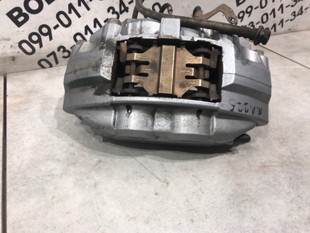 41011JL00A NISSAN Суппорт тормозной передний левый купить в Полтава
