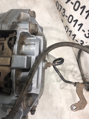 41011JL00A NISSAN Суппорт тормозной передний левый купить в Украина