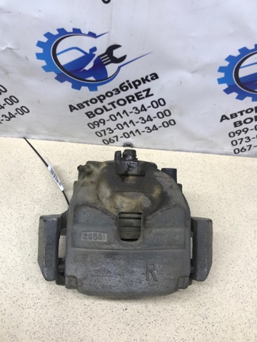 Суппорт тормозной, передний, правый 45002TL1G01 HONDA