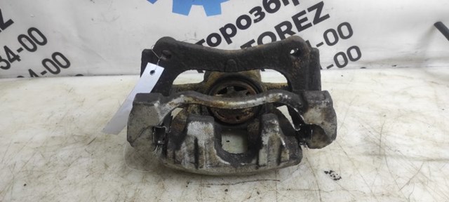 Суппорт тормозной передний левый 4775005060 TOYOTA