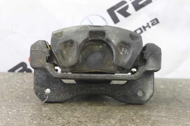 Суппорт тормозной передний левый 4775033340 TOYOTA