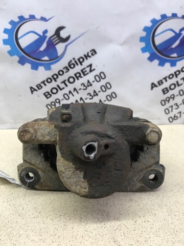 4775042040 TOYOTA Суппорт тормозной передний левый купить в Ирпень