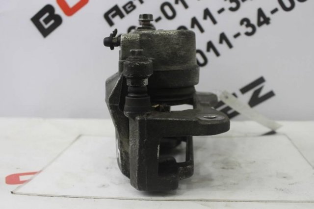 4785033211 TOYOTA Суппорт тормозной задний левый купить в Чернигов