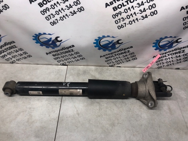 Стойка амортизатора задняя 4M0616031AK VAG