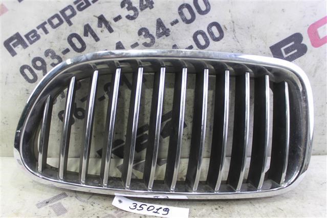 Решетка радиатора левая 51137200727 BMW