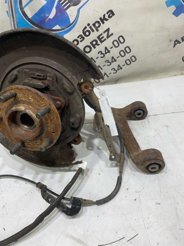 HYUNDAI 527102P000 Цапфа (поворотный кулак) задний левый в наличии Ужгород