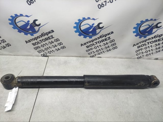 Стойка амортизатора задняя 562005X21C NISSAN