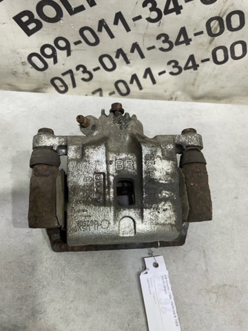 Задний правый суппорт 582303E600 HYUNDAI