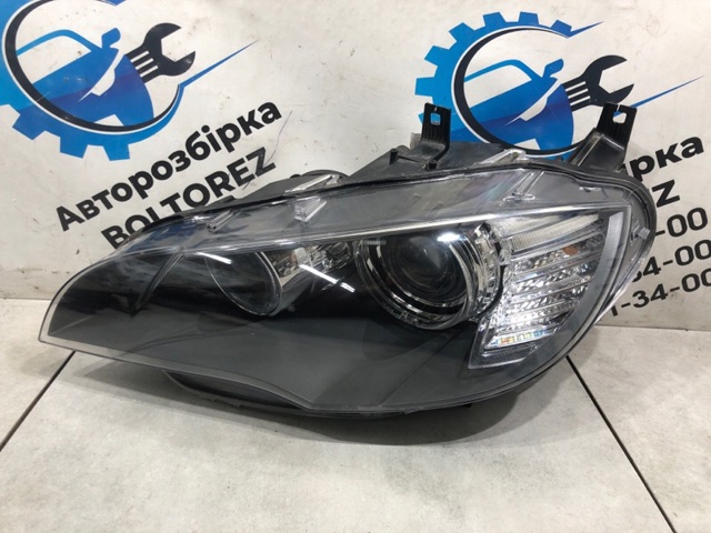 Вставка фары левой 63117287011 BMW