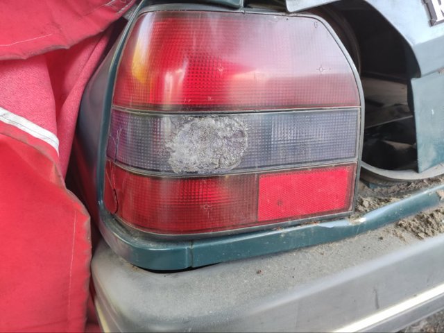 Фонарь задний левый 7701034110 RENAULT