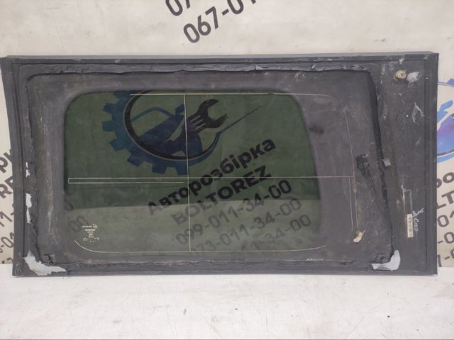 NISSAN 83306EB315 Стекло кузова (багажного отсека) правое в наличии Украина