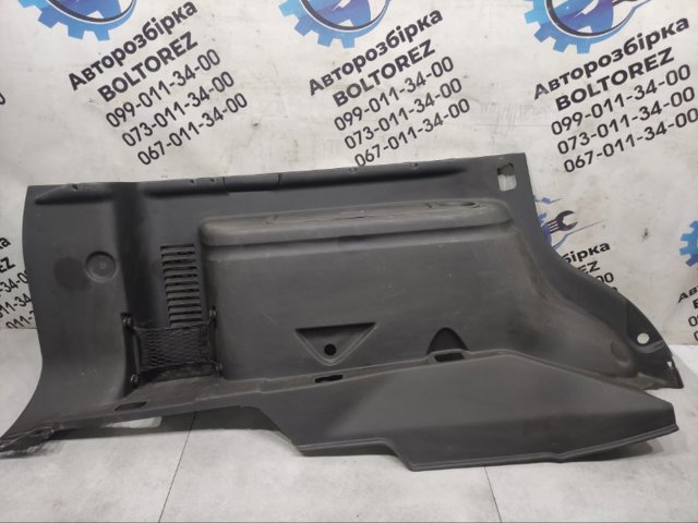 Облицовка багажного отсека, левая 84951EB312 NISSAN