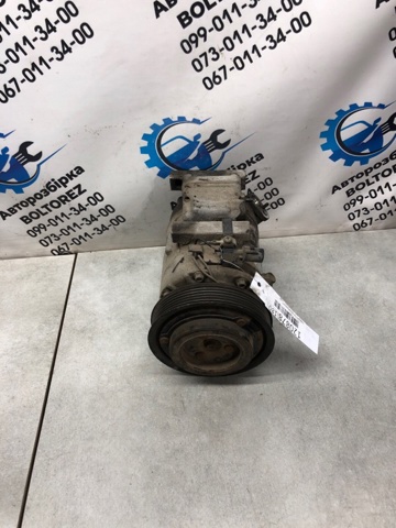 Компрессор климатической установки 977012H000 HYUNDAI