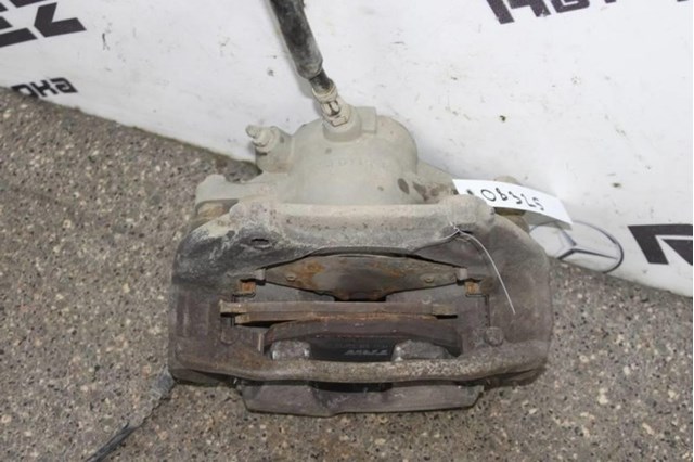 Тормозной суппорт A0034200283 MERCEDES