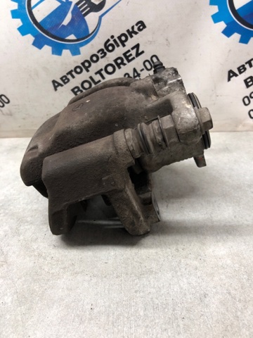Суппорт тормозной левый задний A1664230581 MERCEDES