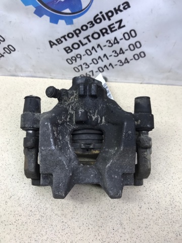 Задний левый суппорт A2044230181 MERCEDES