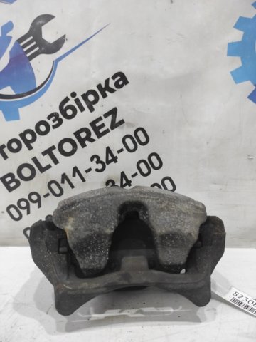 Суппорт тормозной, передний, левый A2054210181 MERCEDES