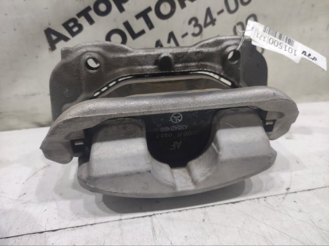 Суппорт тормозной передний левый A2054210381 MERCEDES