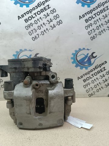 Суппорт тормозной левый задний A2054230181 MERCEDES