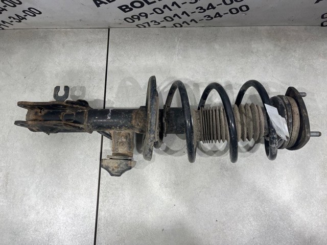 Амортизаторная стойка передняя левая BHS234900A MAZDA