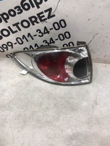 Задний левый стоп G21B51160B MAZDA