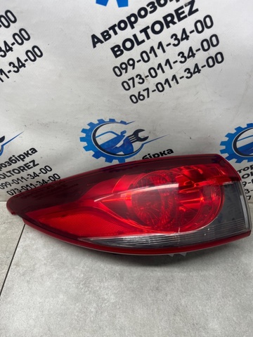 Фонарь задний левый, внешний GHK151160B MAZDA