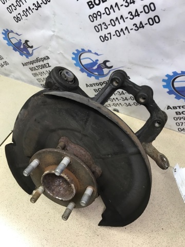 Цапфа (поворотный кулак) задний левый GHR12612XA MAZDA