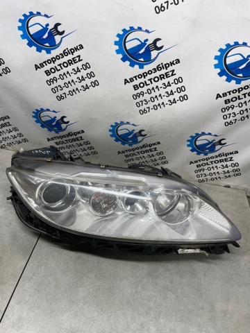 Вставка фары правой GJ6S51031B MAZDA