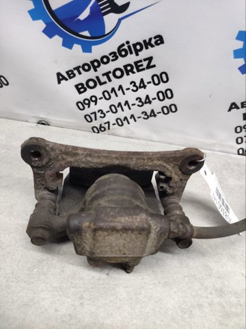 Задний правый суппорт MN116310 MITSUBISHI