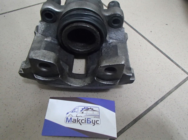 Суппорт тормозной задний правый Mercedes Sprinter 1 2-t