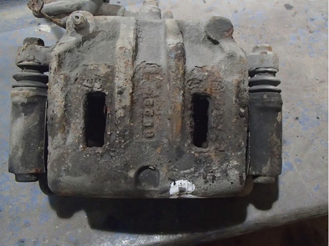 Тормозной суппорт 581303E600 HYUNDAI