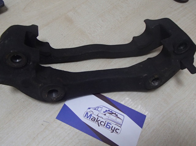 Скоба суппорта переднего 6568107 FORD