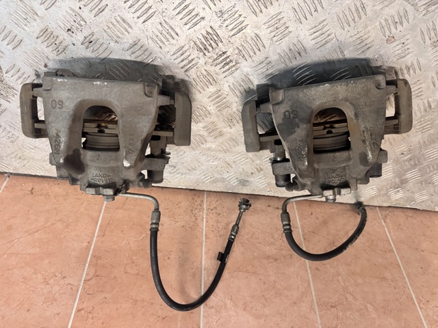Суппорт тормозной передний правый LR090688 LAND ROVER