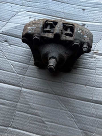 Суппорт тормозной левый задний A0004209283 MERCEDES