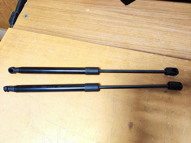Опора капота левая 654714GA1A NISSAN