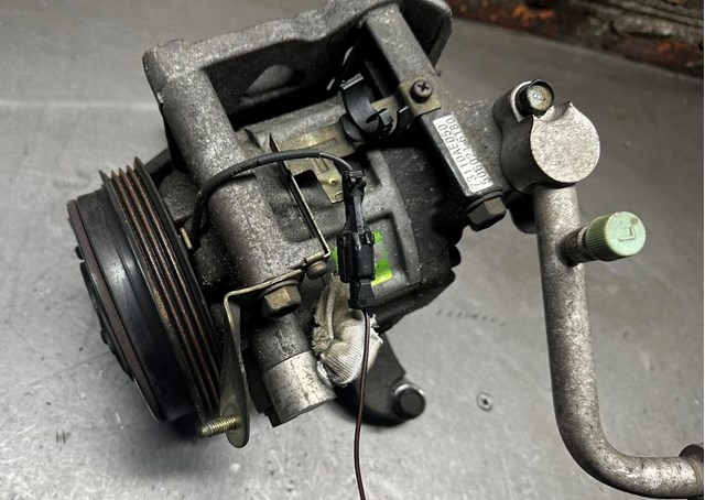 Компрессор климатической установки 73111AE021 SUBARU