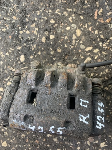 Суппорт тормозной передний правый 26292SC021 SUBARU