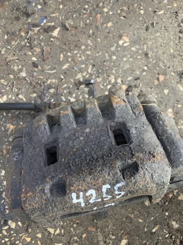 Суппорт тормозной передний левый 26292SC031 SUBARU