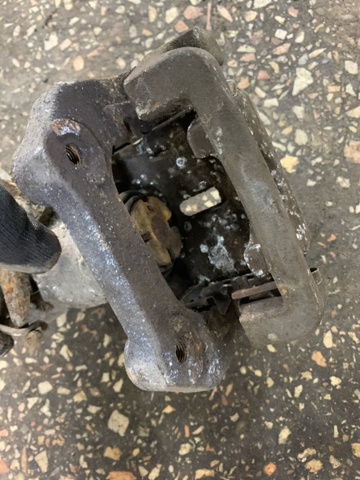 5540261M00999 SUZUKI Суппорт тормозной задний левый купить в Каменское