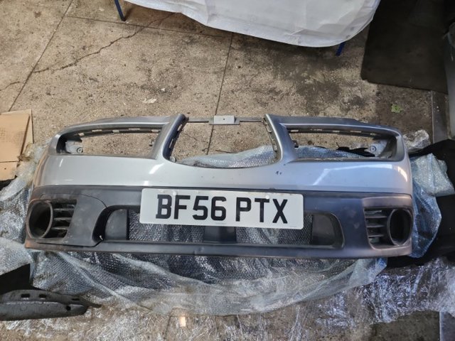 Буфер (бампер) передний 57704XA06A SUBARU
