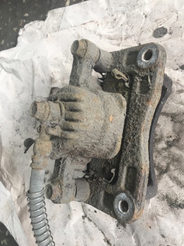 582103E600 HYUNDAI Суппорт задний левый купить в Николаев