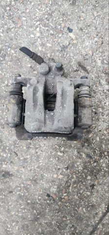 Задний правый суппорт 582302Y310 HYUNDAI