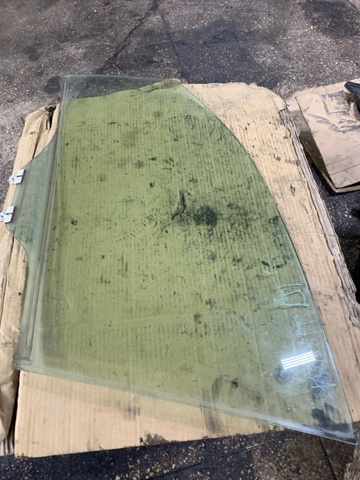Стекло водительской двери 61011SG010 SUBARU