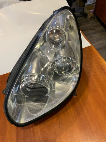 Вставка фары левой 84001XA25A SUBARU