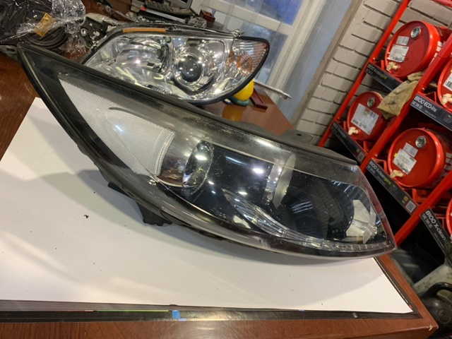 Вставка фары правой 921023W121 HYUNDAI