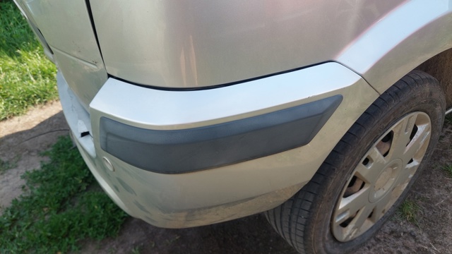 1431027 FORD Накладка бампера заднего правая купить в Одесса