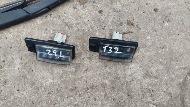 Фонарь освещения номера 265108990B NISSAN