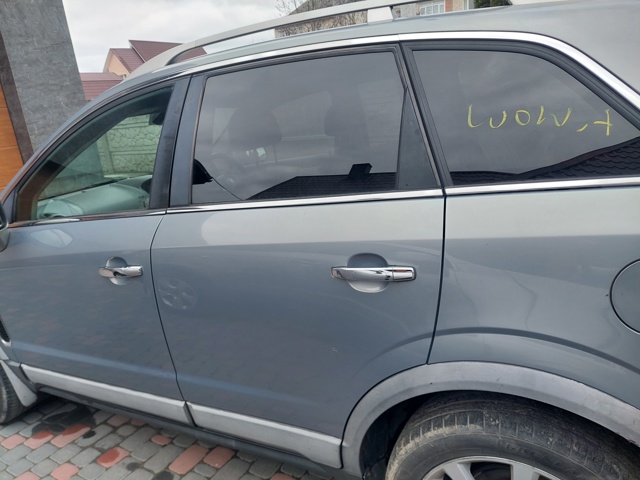 Стекло двери задней левой 96624064 OPEL