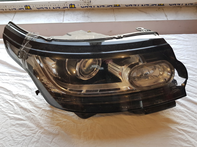Вставка фары правой LR046921 LAND ROVER