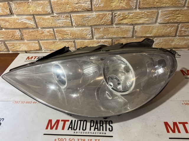 Фара левая передняя 89006375 PEUGEOT